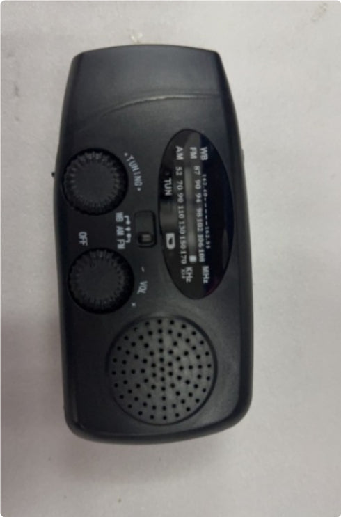 Solar hand crank USB charging radio flashlight